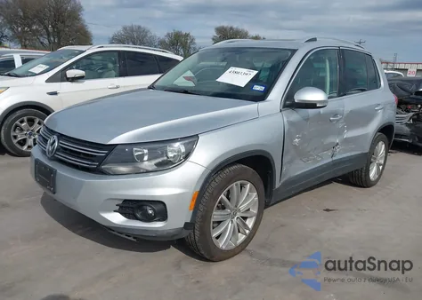 2014 Volkswagen Tiguan Sel из США, поврежденный, VIN WVGAV3AX4EW530300